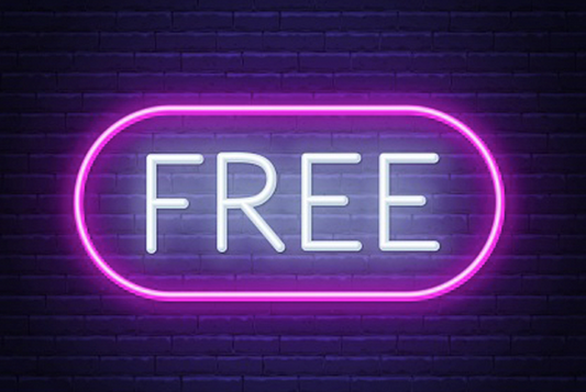 neon sign saying "FREE" white text pink border