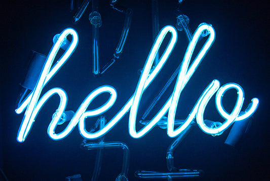 Neon sign that says "hello" - Team name ideas for your next trivia event.